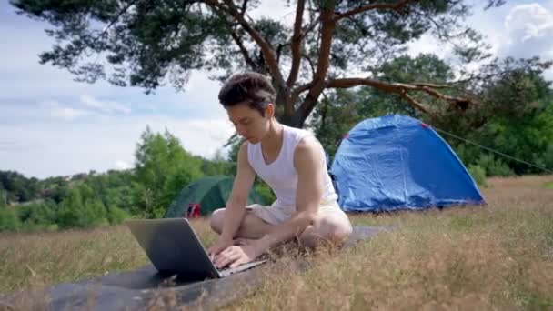 Young Male Freelancer Works Laptop Sitting Mat Black Haired Man — Stock videók