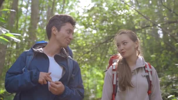 Young Couple Hikers Walks Together Discussing Vacation Smiling Happy Man — Video