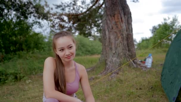 Young Woman Smiles Upset Boyfriend Sitting Green Tent Couple Has — Stok video