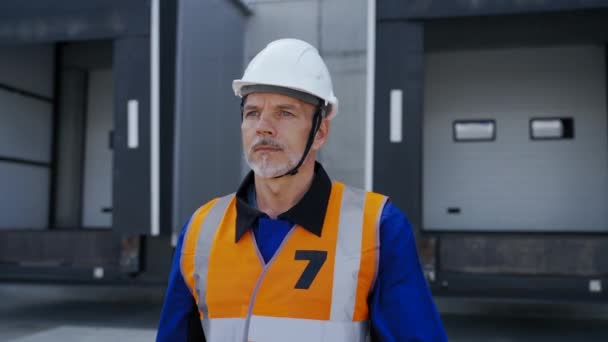 Pov Engineer White Helmet Walking Loading Docks Modern Warehouse Complex — Stockvideo