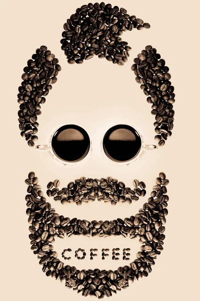 コーヒー豆でできた男の顔が — ストック写真