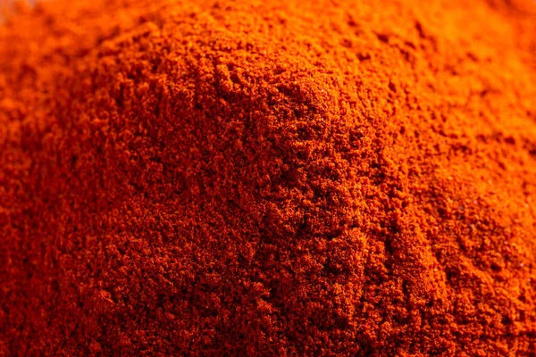 Red Paprika powder food spice ingredient. Macro photo