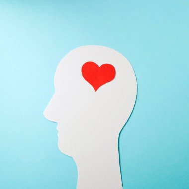 Silhouettes on a blue background. Minimalist concept of love.