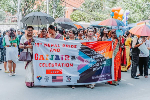 KATHMANDU, NEPAL - Aug 12,2022: Members from the LGBTQI+ takes part in a pride parade Gaijatra Festival organized by the Blue Diamond Society Nepal in kathmandu. Gaijatra festival is also known as the festival of cows.