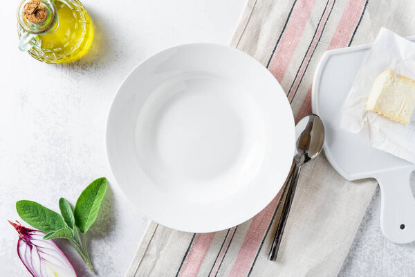 set of empty dishes on the table on a white background