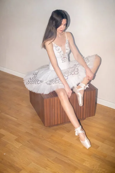 Ballerina White Tutu Sits Bedside Table — 图库照片