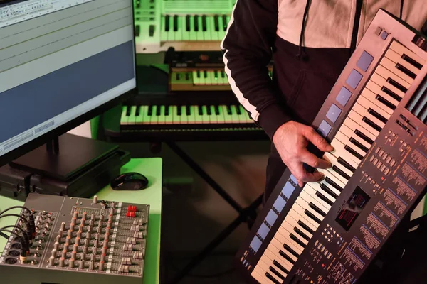 Musician Plays Synthesizer Small Home Studio While Creating Recording Electronic — стоковое фото