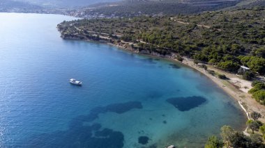 aerial view of the sea with island and boat