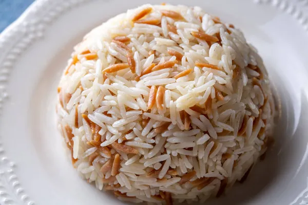 Traditional delicious Turkish food; Turkish style rice pilaf (Turkish name; Arpa sehriyeli pirinc pilavi)