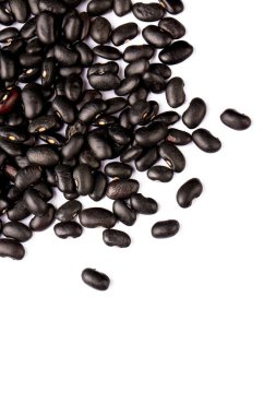 Siyah fasulyeye yakın pişmiş, organik tanecikler.,.