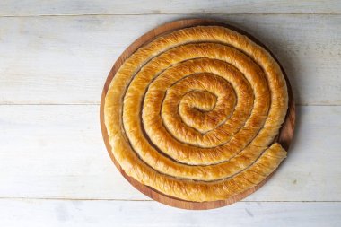 Turkish tepsi boregi, round borek, delicious food concept