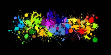 Splashing colorful watercolor colors on paper to create a background texture. Black background.