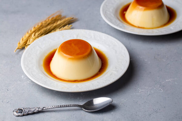 Cream caramel pudding with caramel sauce in plate