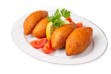 Kibbeh, Orta Doğu mutfağında (Türkçe: icli kofte) popüler bir yemektir.)
