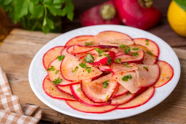 Turkish appetizers; sliced radish appetizer with sour, Turkish name; Turp mezesi