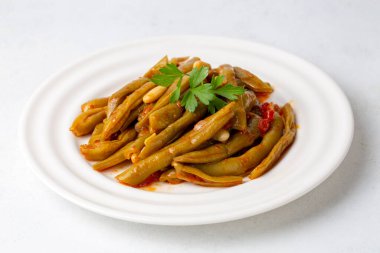 Geleneksel lezzetli Türk yemekleri; zeytinyağlı yeşil fasulyeler; Türk adı; Zeytinyagli taze fasulye