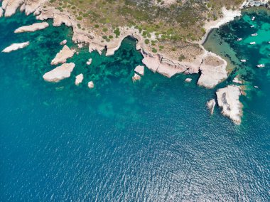 Siren rocks in Greek mythology, a creature half bird and half woman who lured sailors to destruction by the sweetness of her song at Phokaia (Foca ), izmir, Turkey. Aerial photography with drone