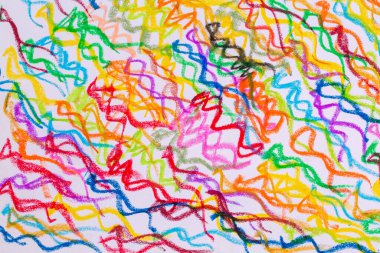 Colorful pastel crayons with painting background