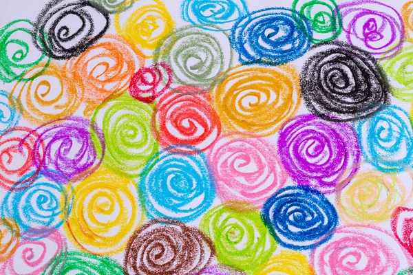Colorful pastel crayons with painting background