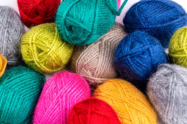 Colorful wools on the white background