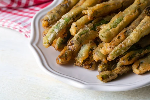 Turkish foods; Crispy baked green beans, fried beans (Turkish name; kizarmis yesil fasulye)