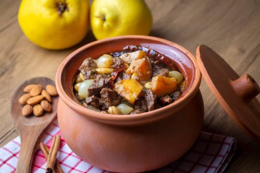 Traditional delicious Turkish foods; Quince and plum lamb stew, lamb tandoori (Turkish name; Ayvali - erikli kuzu guvec - kuzu tandir
