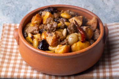 Traditional delicious Turkish foods; Quince and plum lamb stew, lamb tandoori (Turkish name; Ayvali - erikli kuzu guvec - kuzu tandir