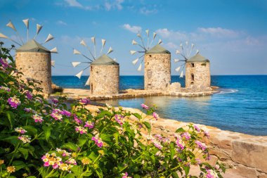 Greece island; Chios island historical windmill. Travel concept photo. clipart