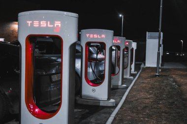 Sandefjord, Norway - februar 25, 2022: Silver Mercedes EQC Parked At Tesla Supercharger Station. The Mercedes EQC Is A Full-sized All-electric Five-door SUV