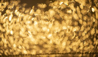 Altın bokeh çözünmüş parıltı, soyut arkaplan sarı sıcak bokeh.