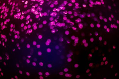 mor bokeh çözünmüş simler, koyu arkaplanda mor bokeh ile soyut arkaplan