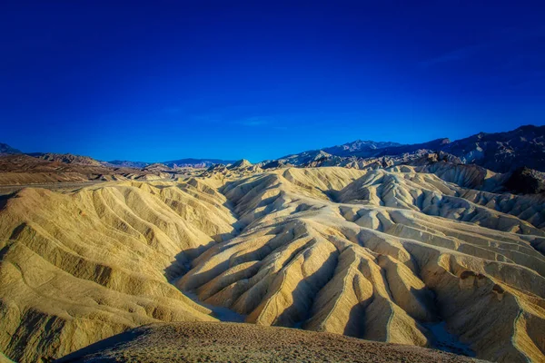 Zabriskie Point Lookout Surreal Landscape Undulating Ridges Gold Orange Brown — Stock Fotó