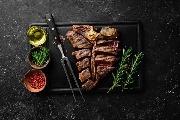 Aged Beef Bone Steak Juicy Cooked Steak Rosemary Spices Top — Stock Photo, Image