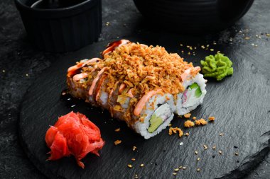 Traditional sushi rolls on a stone plate. Close-up. Sushi menu. Japanese food.