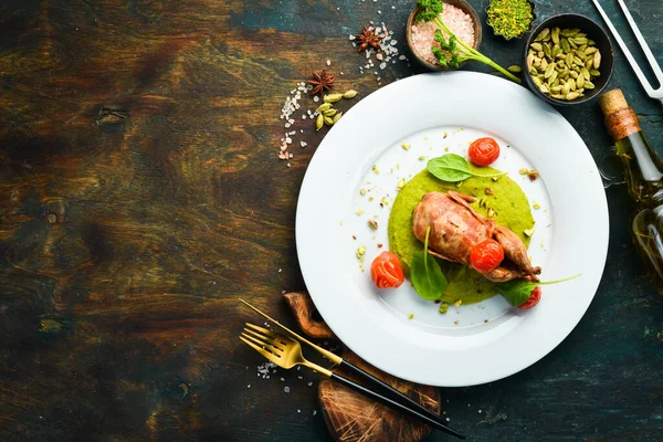 Baked Quail Bacon Spinach Hummus White Plate Top View Rustic — Stock Photo, Image