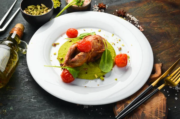 Baked Quail Bacon Spinach Hummus White Plate Top View Rustic — Stock Photo, Image