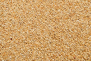 Beyaz kinoa makro fotoğraf. Sağlıklı organik yiyecekler. Taş zeminde. Üst görünüm.