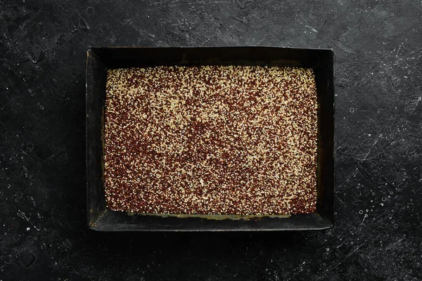 Red, black and white quinoa grains. Healthy food background. Seeds of white, red and black quinoa - Chenopodium quinoa
