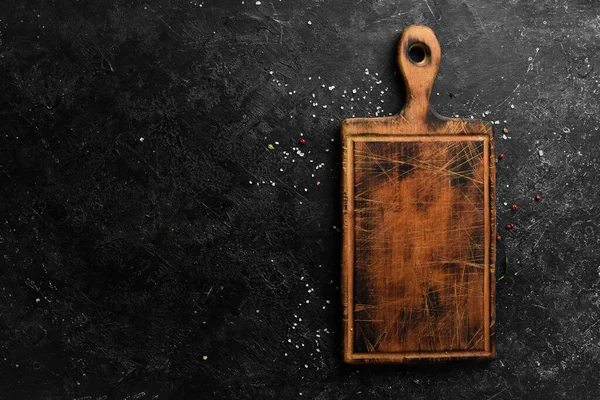 Kitchen Wooden Board Black Stone Background Top View — Stock Photo, Image