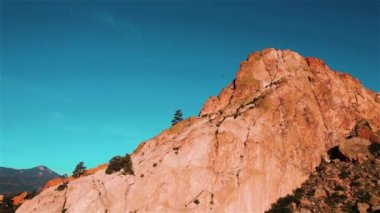 Garden of the Gods Colorado Drone View 2 4K features a view from a drone flying left to right across one of the largest rock formation in Garden of the Gods, Colorado.  