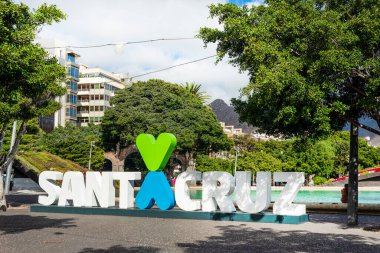 Santa Cruz de Tenerife square with its fountain and trees on a sunny day. Canary Islands. Spain