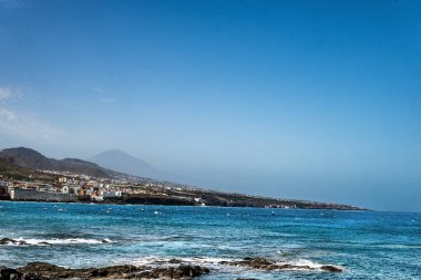 View of the north coast of the island of Tenerife with the Teide volcano in the background. Canary Islands. Spain