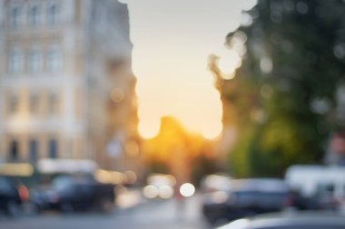 Güzel gün batımı şehir bokeh. Arka plan bulanık fotoğraf.