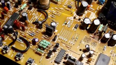 Radio components on electronic board rotates with original sound of motorized mechanism 