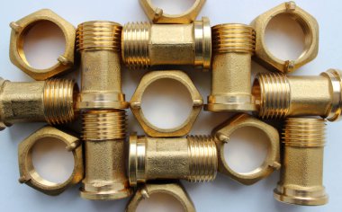 Hijyenik ve Tesisat Ürünleri. Pirinç Sığdırma ve Su Ölçer Bağlantısı Doku Arkaplanı İçin Fındık