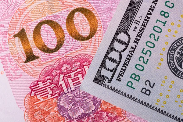 Overlapping Fragmentary 100 Chinese Yuan 100 Dollar Bills — Stock Photo, Image