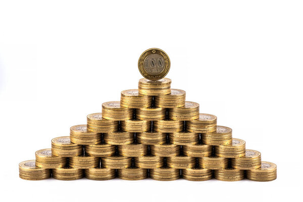 100 Kazakhstani tenge coins stacked in the form of a pyramid