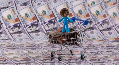 Yazı yerine 1 Amerikan doları değerinde bozuk parası olan bir adamın sembolik figürü.