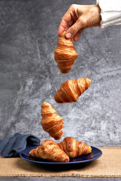 Hand Woman Dropping Croissants Plate Healthy Breakfast Sweets Desserts — Stock Photo, Image