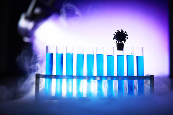 Test tube of glass overflows new liquid solution potassium blue conducts an analysis reaction takes various versions reagents using chemical pharmaceutics cancer manufacturing 